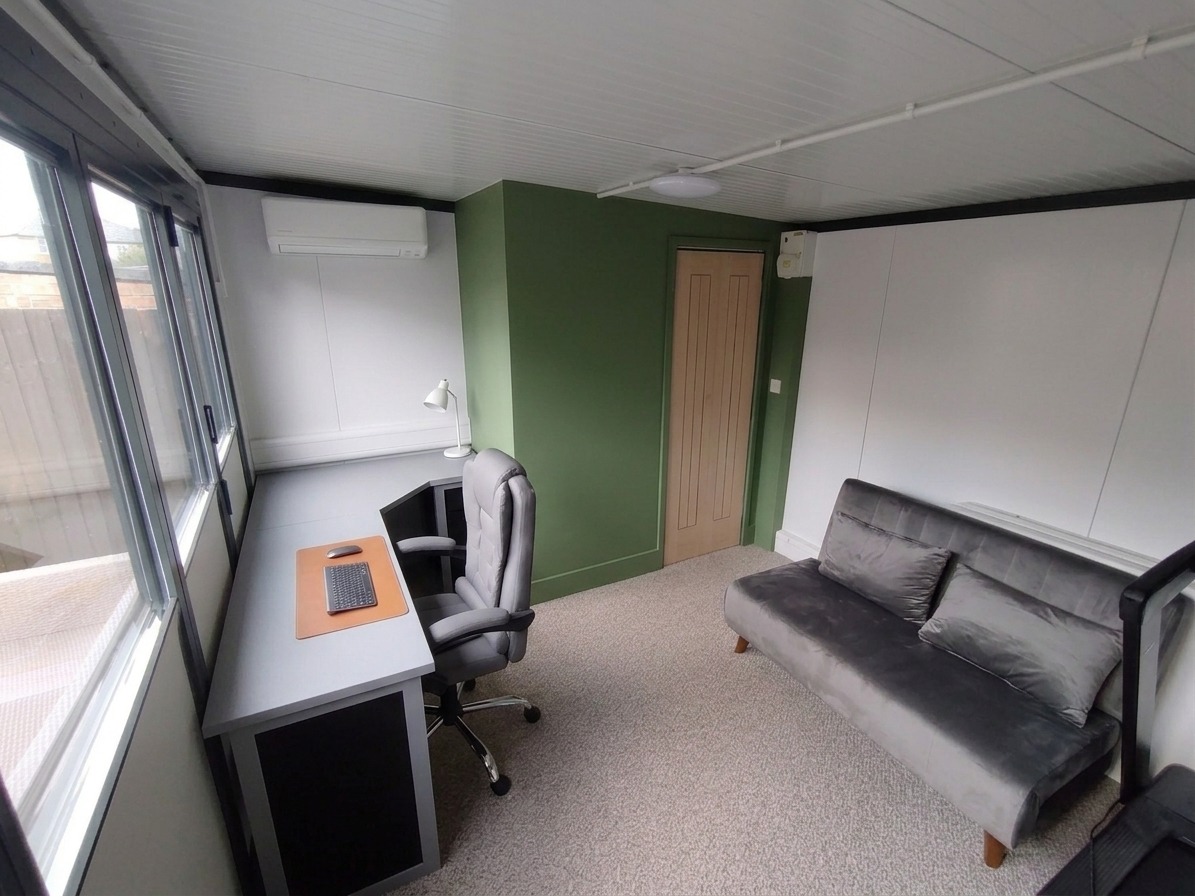 Garden office interior with fitted desk